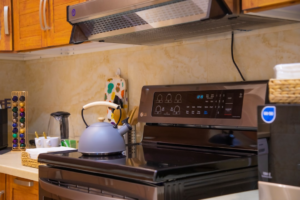Modern kitchen prepared for indoor electric grilling and smoke control
