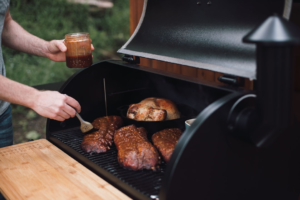 Ribs cooking low and slow in a backyard pellet smoker